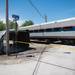 Half of a semitrailer sits next to an Amtrak train at North Maple Road and Huron River Drive in Ann Arbor Township after being struck by the train, Saturday, May 25.
Courtney Sacco I AnnArbor.com